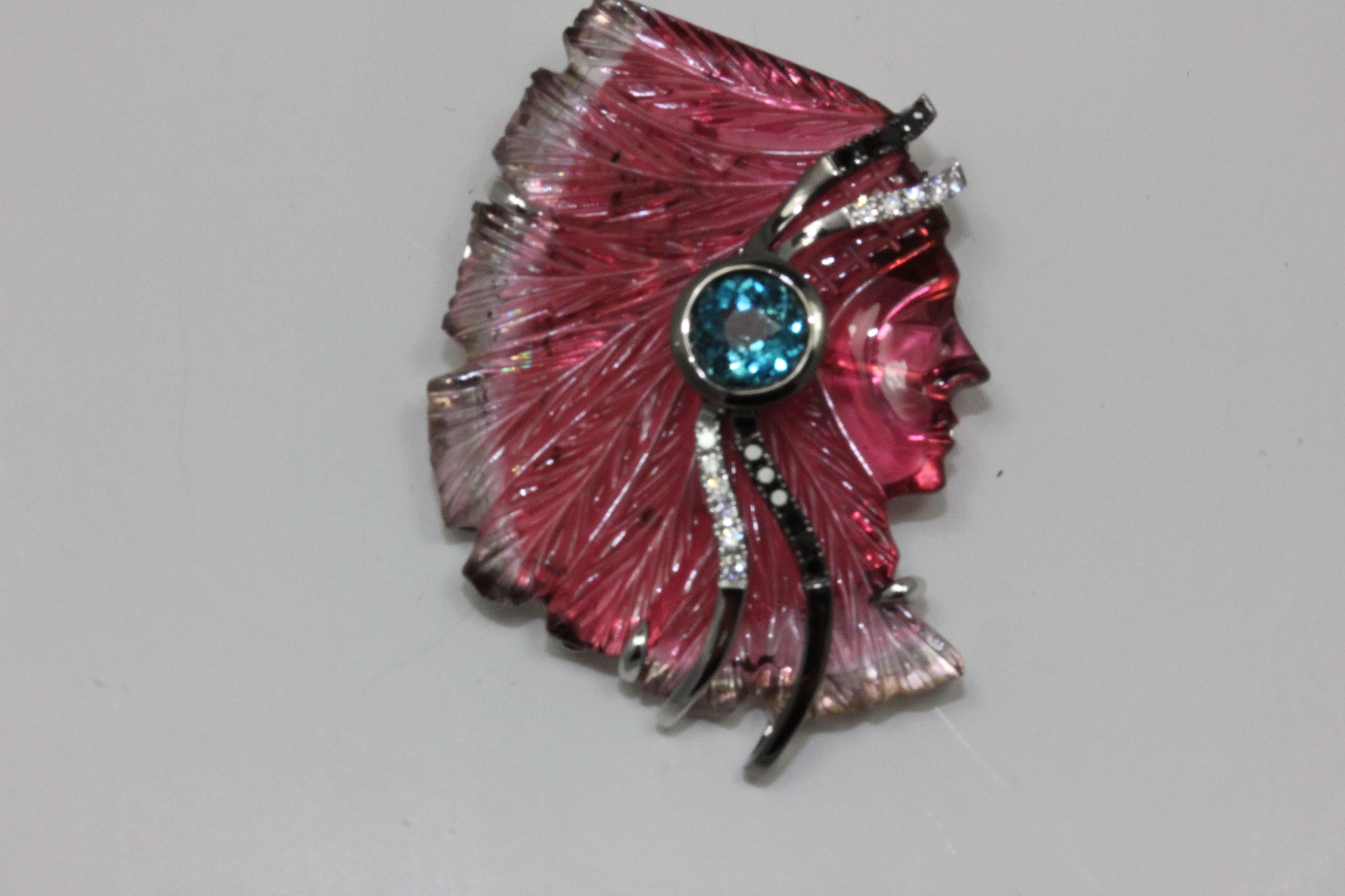 18K WG INDIAN HEAD DESIGN BICOLOR TOURMALINE WITH ROUND BLUE TOURMALINE, BLACK AND WHITE DIAMOND ONE OF A KIND BROOCH/PENDANT
BLT 0.99 Carats, BCT 24.35 Carats, 11 BKD 0.11 Carats, 11 WDIA 0.09 Carats