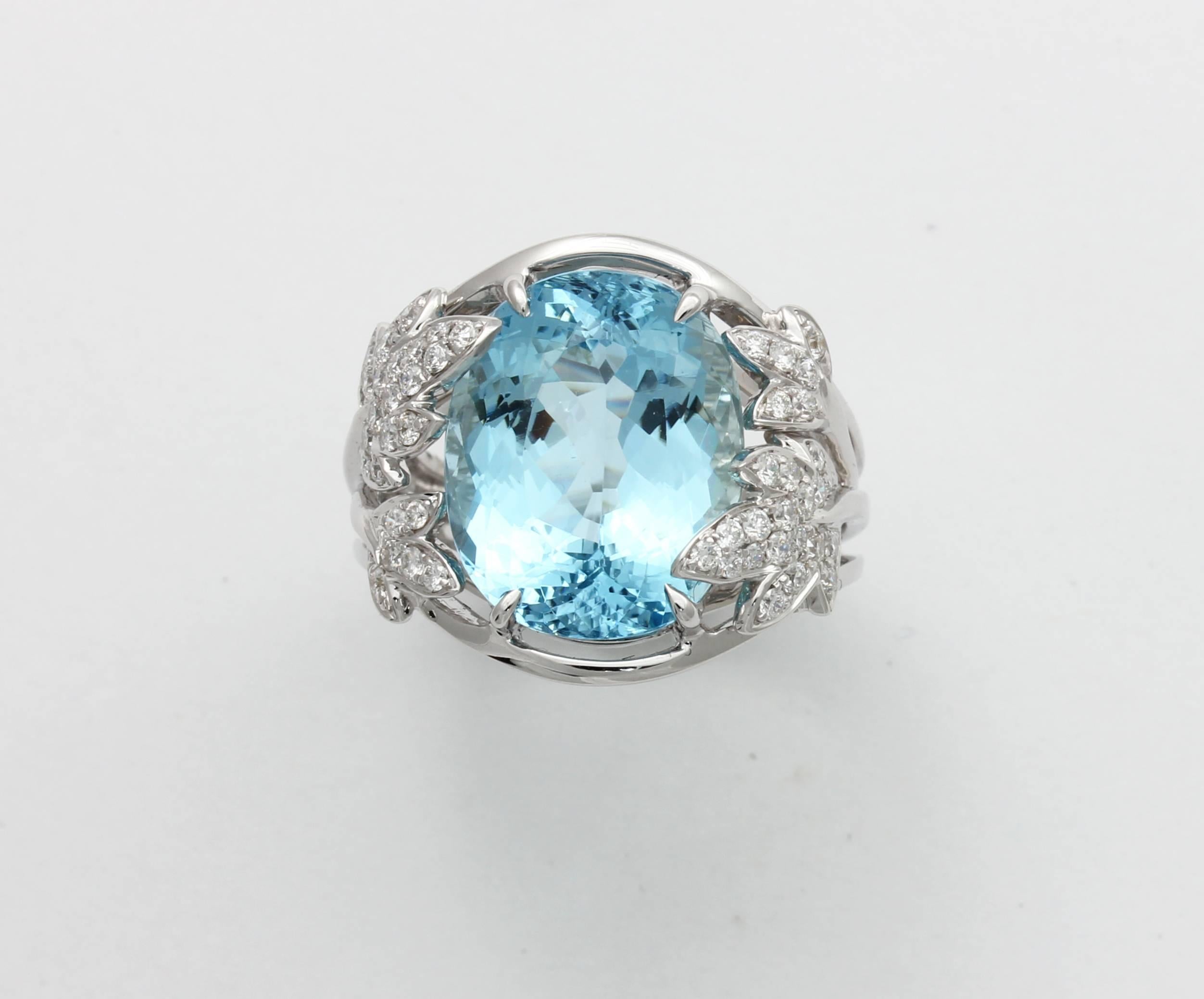 One-of-a-kind Frederic Sage oval Aquamarine ring with diamond leaf accents set in 18 karat white gold

Total Aquamarine weight: 9.89 ct
Total diamond count: 50
Total diamond weight: 0.60 ct
Finger size: 7