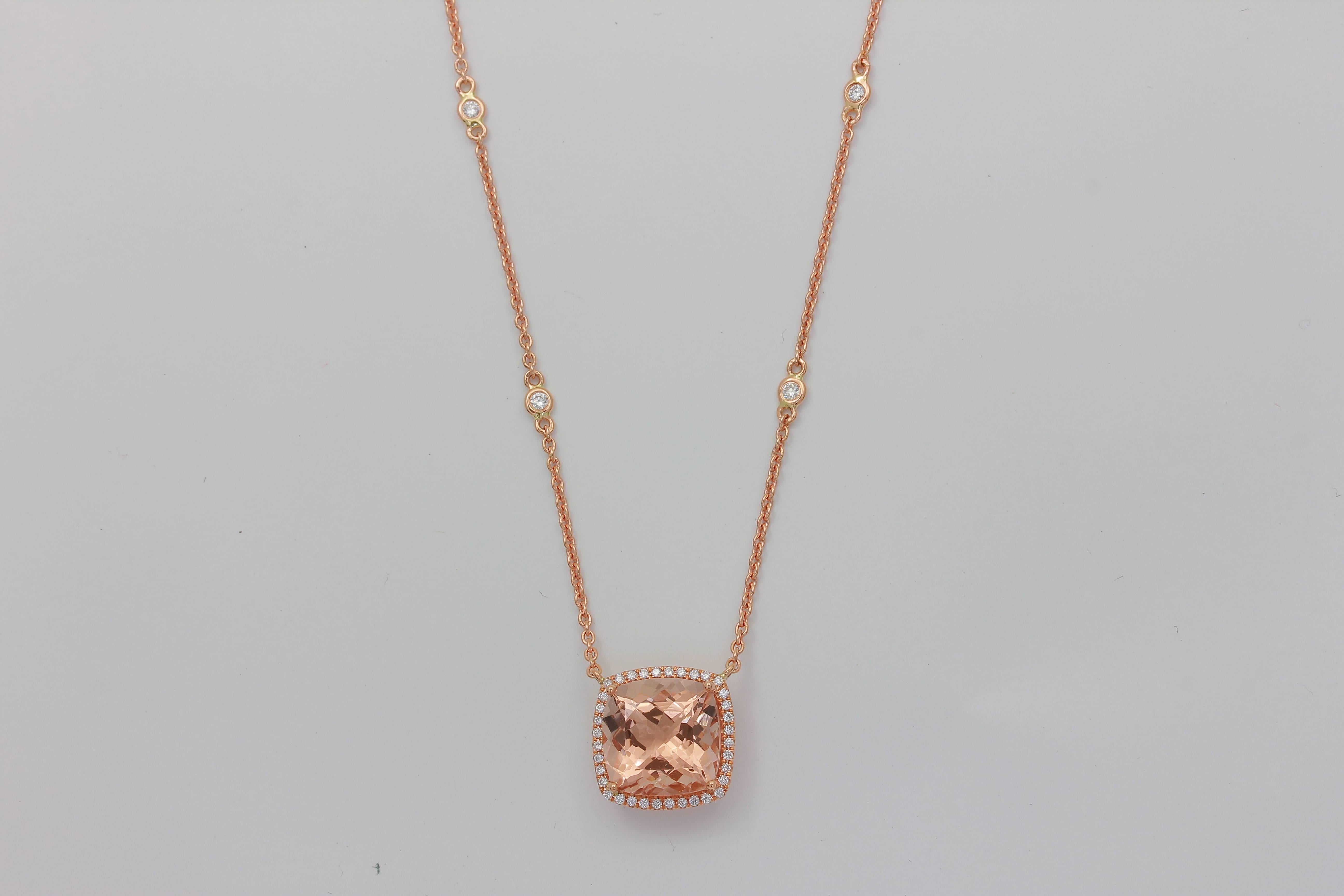 18K PG SMALL CU MORGANITE WITH DIAMOND HALO ONE-OF-A-KIND PENDANT WITH ATTACHED DIAMOND CHAIN
Morganite  5.45 Carats
6 Diamonds 0.13 Carats, 36 Diamonds 0.14 Carats