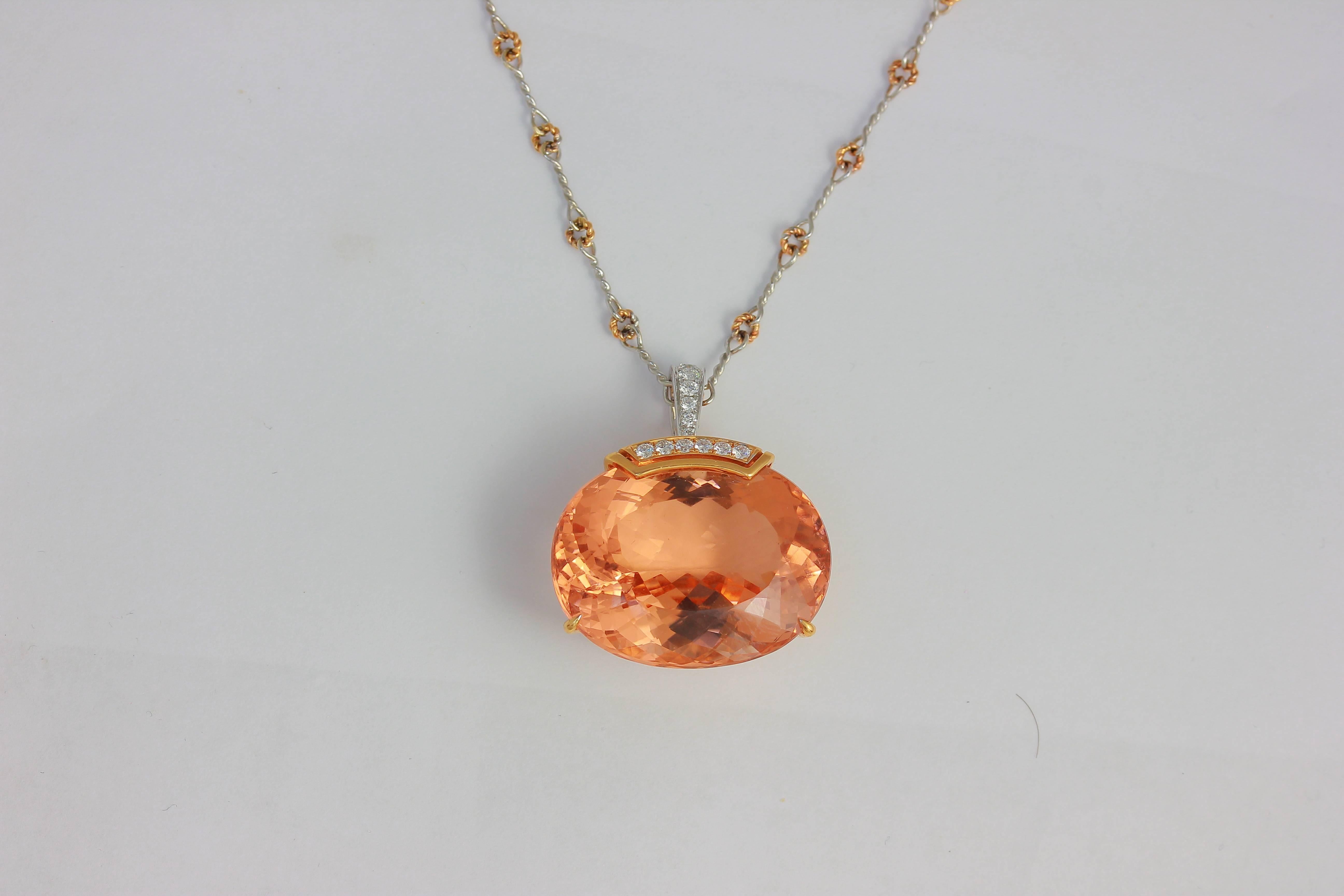 18K PWG OVAL MORGANITE AND DIAMOND ONE OF KIND PENDANT 
MORG 55.53 Carats, 16 DIA 0.36 Carats