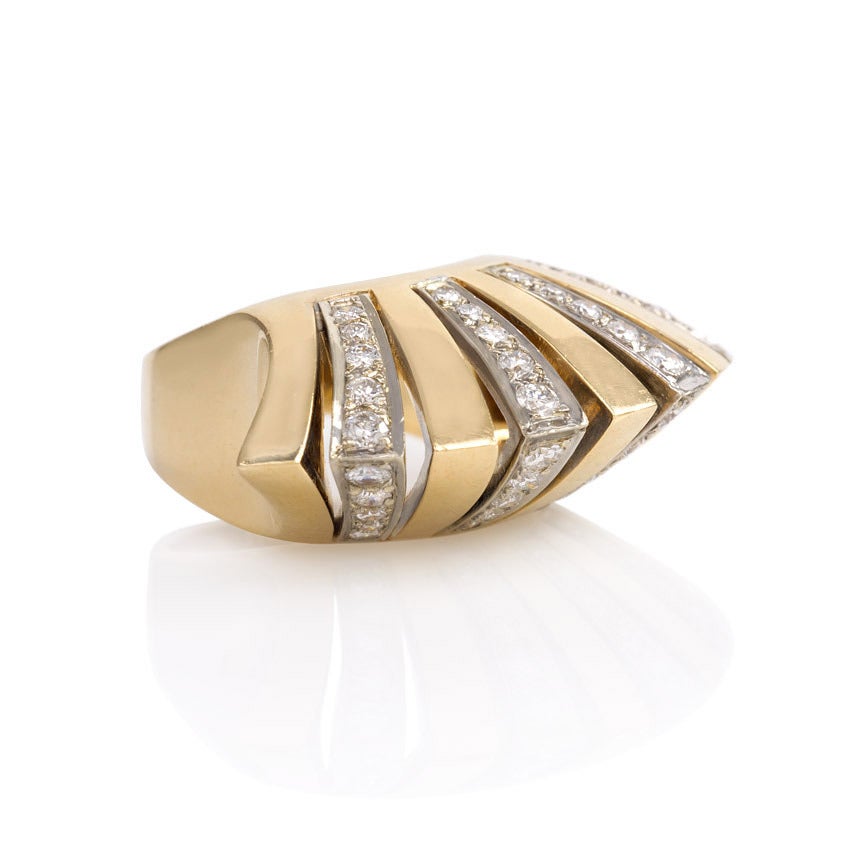 A Retro diamond ring of open fan-shaped design, set with approx. 0.80 ct. tw. diamonds, in 14k gold and platinum.