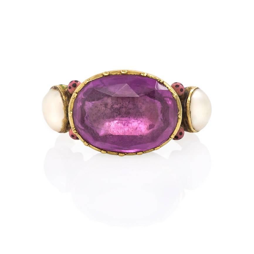An antique tourmaline and half pearl ring with a rose-diamond shank and enamel detailing, in 22k. India.

Current size: 5 1/4.
Top measures approximately 24mm wide x 12mm high