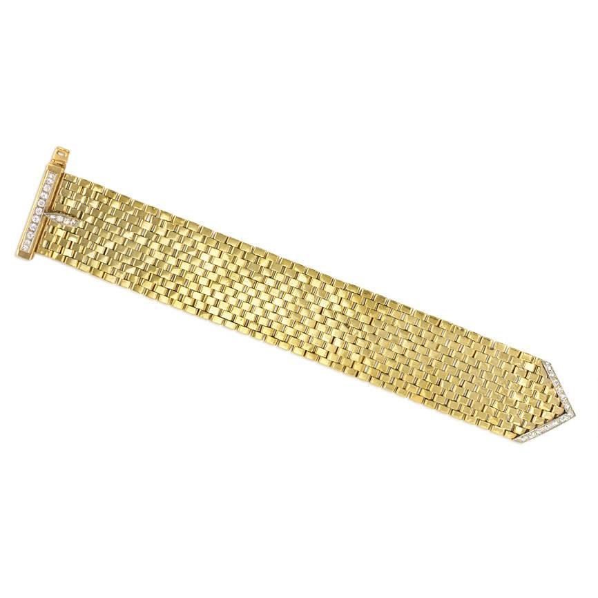 A Retro adjustable gold and diamond brick-link buckle bracelet, in 18k and platinum. Austro-Hungary.