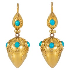 Pendientes antiguos con forma de ánfora en oro y turquesa