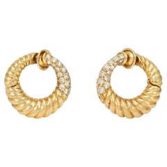 Van Cleef & Arpels, Paris, ribbed gold and diamond hoop earrings