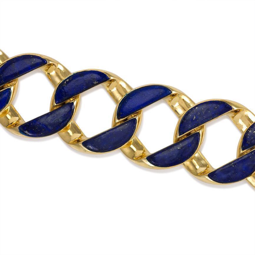A gold curblink bracelet inlaid with lapis, in 18k. Cartier, London. #P1863. Maker's Mark for Jean-Jacques Cartier.
