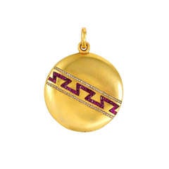 Late Victorian Gold Locket Accented with Rubies and Diamonds