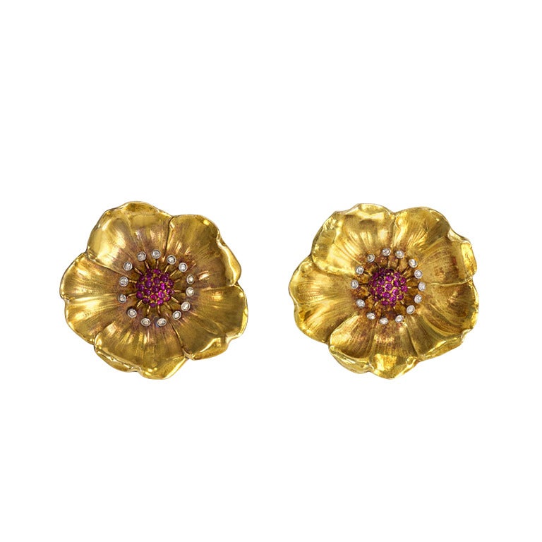 A Pair of 1940s Ruby Diamond Gold Platinum Flower Brooches