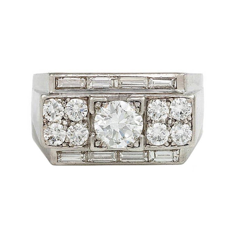 French Art Deco Round and Baguette Diamond Ring of Geometric Design in Platinum