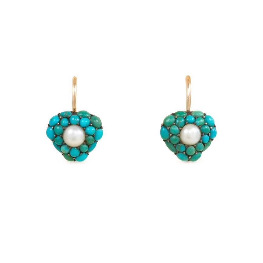 A pair of antique gold and pavé turquoise day-to-night earrings with pearl accents, designed as heart-shaped tops suspending pendulum-like pendants, in 15k.  England.

Measures approximately 2 3/8