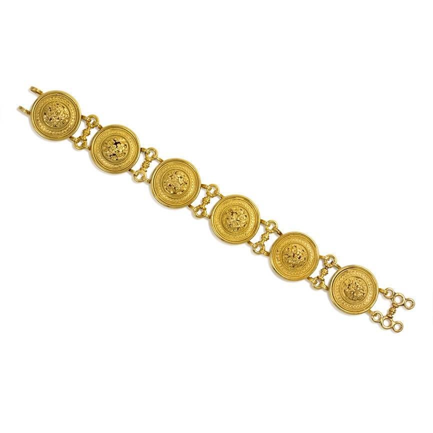A fine antique gold bracelet comprised of six "Millefiori" bulla plaques of relief foliate design, in 18k. Castellani. See Page 41; fig 2-13, Maria Grazia Branchetti; Castellani, and Italian Archaeological Jewelry, Editors: Susan Weber