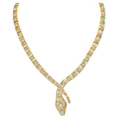 Collana vittoriana con diamanti e oro a forma di serpente intrecciato
