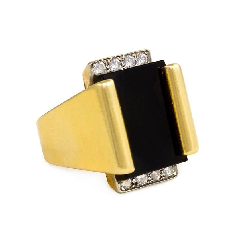 An onyx and diamond rectangular plaque ring, in 18k gold and platinum. Cartier #88319

Plaque dimensions: 2cm x 1.5cm
Current ring size: US 4 3/4 (Please contact us with any sizing questions.)
