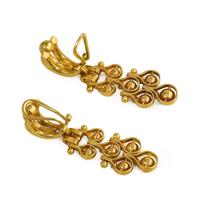 Retro 1940s Gold Earrings with Articulated Ball Pendants
