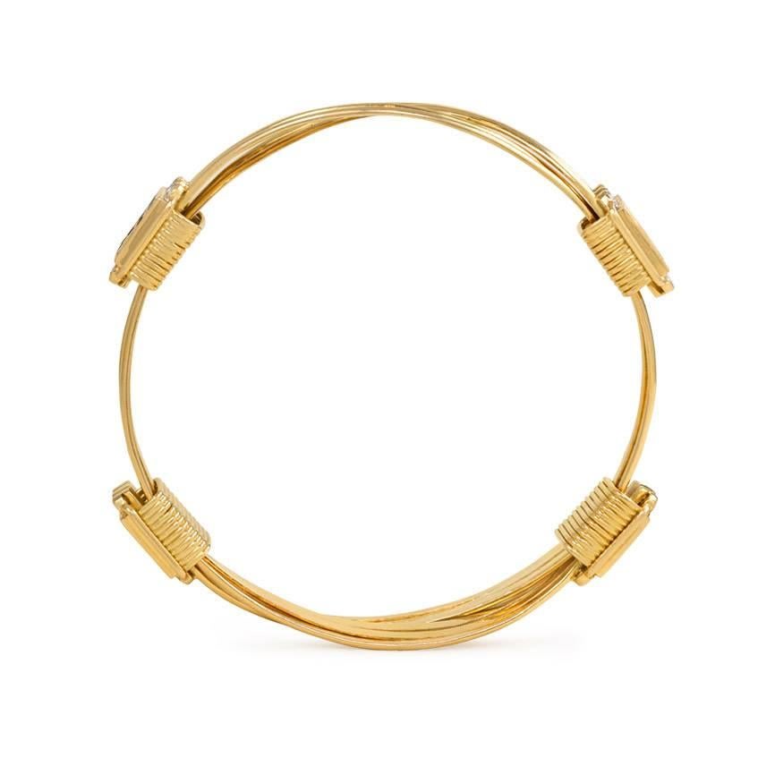Pair of 1970s Gold and Gemset Expandable Bangle Bracelets In Excellent Condition In New York, NY