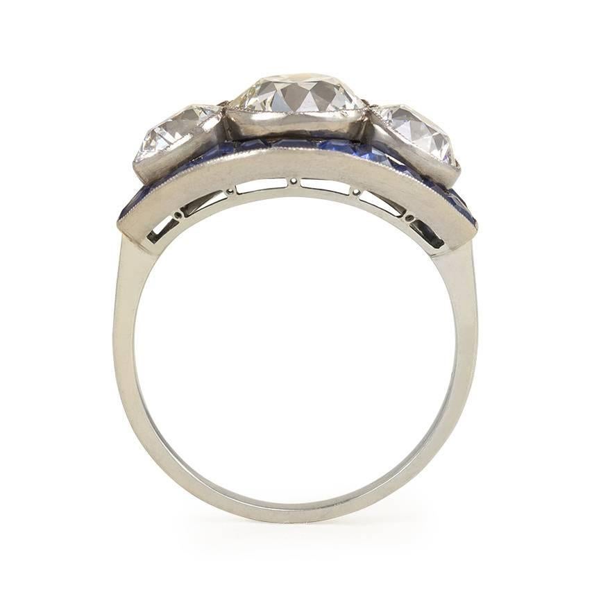 Cushion Cut Art Deco Three-Stone Diamond and Calibré Sapphire Ring