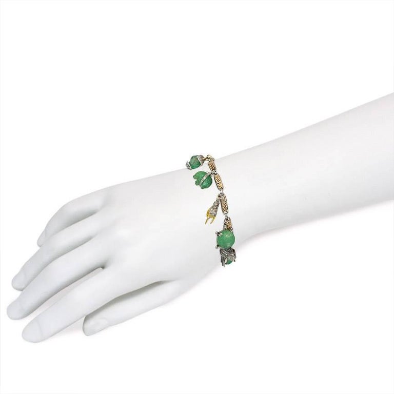 Art Deco Carved Emerald Diamond Gold Platinum Charm Bracelet For Sale