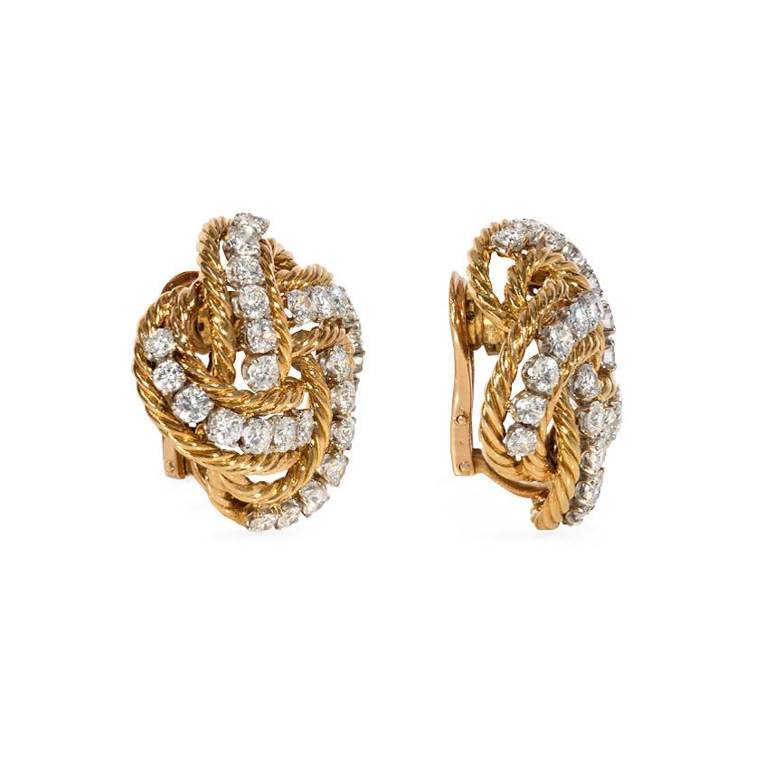 A pair of ropetwist gold and diamond clip earrings of knotted design, in 18k and platinum. Boucheron, Paris. Atw. 4.00 ct. diamonds. #36.43G