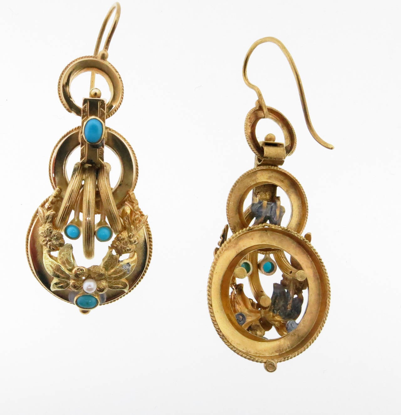 Victorian 14kt. yellow gold turquoise and pearl dangle earrings. Each earring is set with with four turquoise and a pearl and measures 2