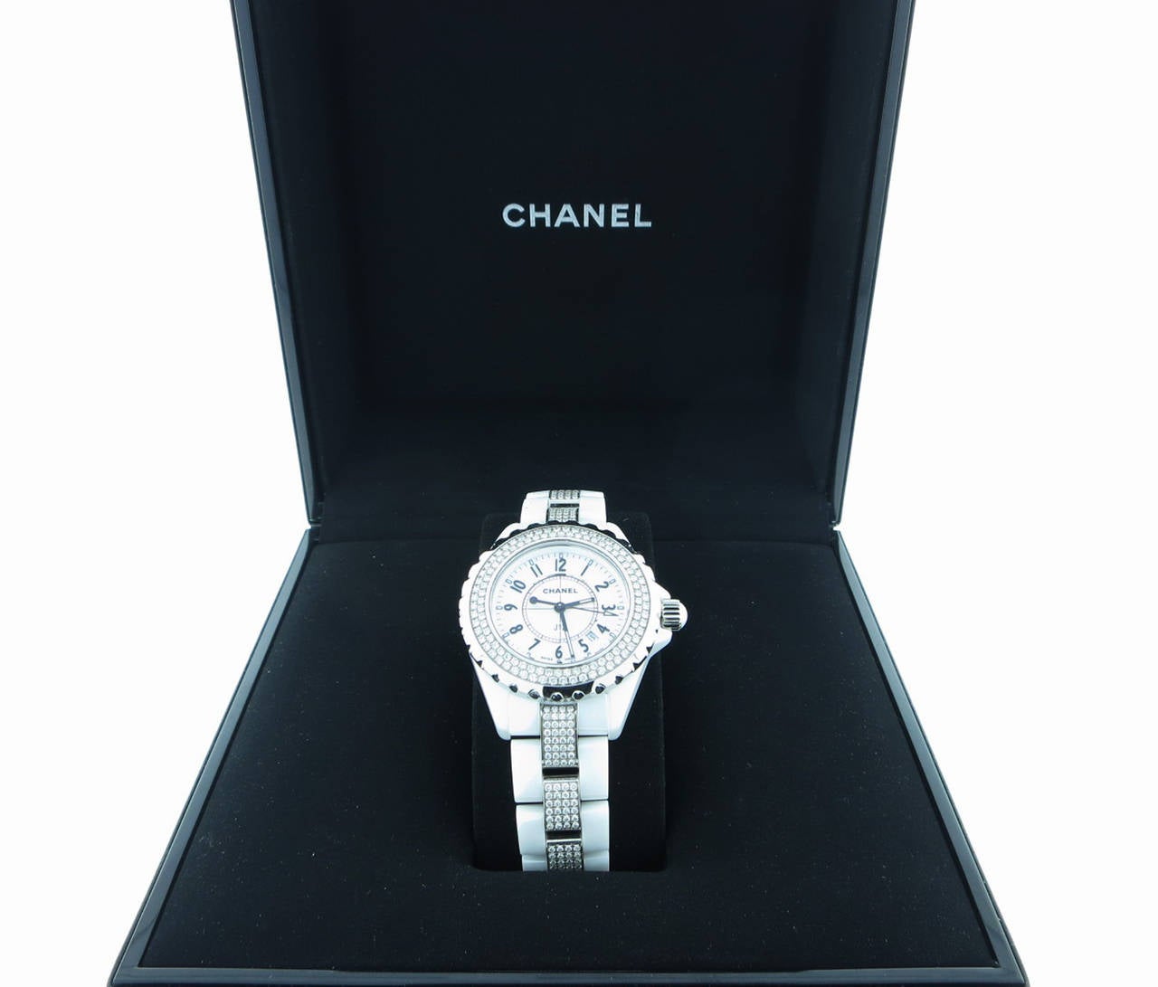 Unisex  Chanel  38mm.  white ceramic quartz wristwatch with diamond bezel and  band with deployant catch. Swiss made. New with box certificate of authenticity and international guarantee. Never worn.
