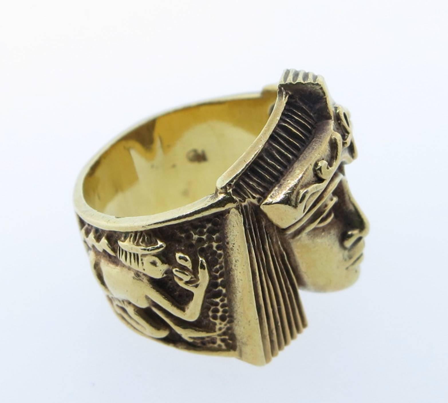 Sculptural 18kt. yellow gold Egyptian revival head ring in fine detail and richly patinated. Size 6 1/2 and can be sized.
