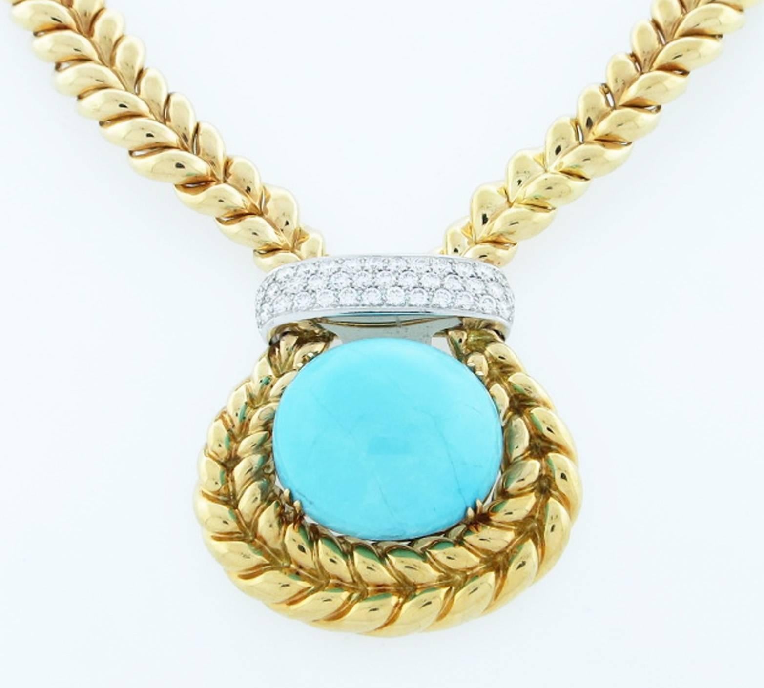 Beautifully constructed turquoise and diamond necklace made by the innovative jeweler Valentin Magro. The 18kt yellow gold illusion design link is set in the center with a large robin egg blue turquoise cabochon measuring approx 1 1/2 inches in