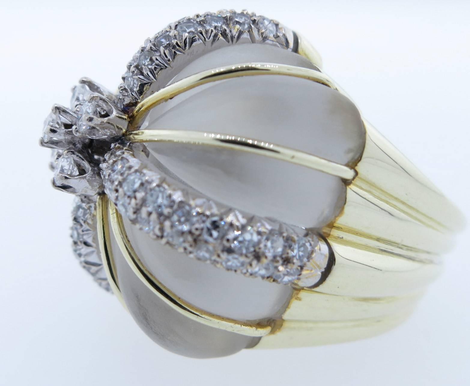 14kt. yellow gold mounted dome ring set with a fluted rock crystal and bead and prong set in white gold with 81 round diamonds totaling approx 1.0 cts. Size 6 and can be sized. Circa 1960.