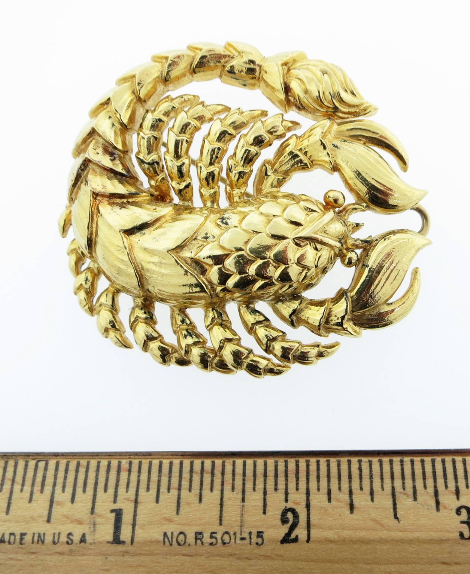 Iconic astrological Webb Scorpio brooch measuring 2 1/2 inches in length in detailed 18kt. yellow gold. Circa 1970.