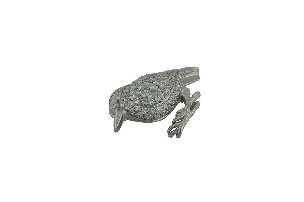 This Burdeen's Jewelry Platinum & Diamond Bird Pin, is so heartwarming and delicate...for any bird lover !!! This precious bird is in a standing position, and is just the perfect compliment to any shirt, sweater, dress, blazer, etc. The 71 diamonds