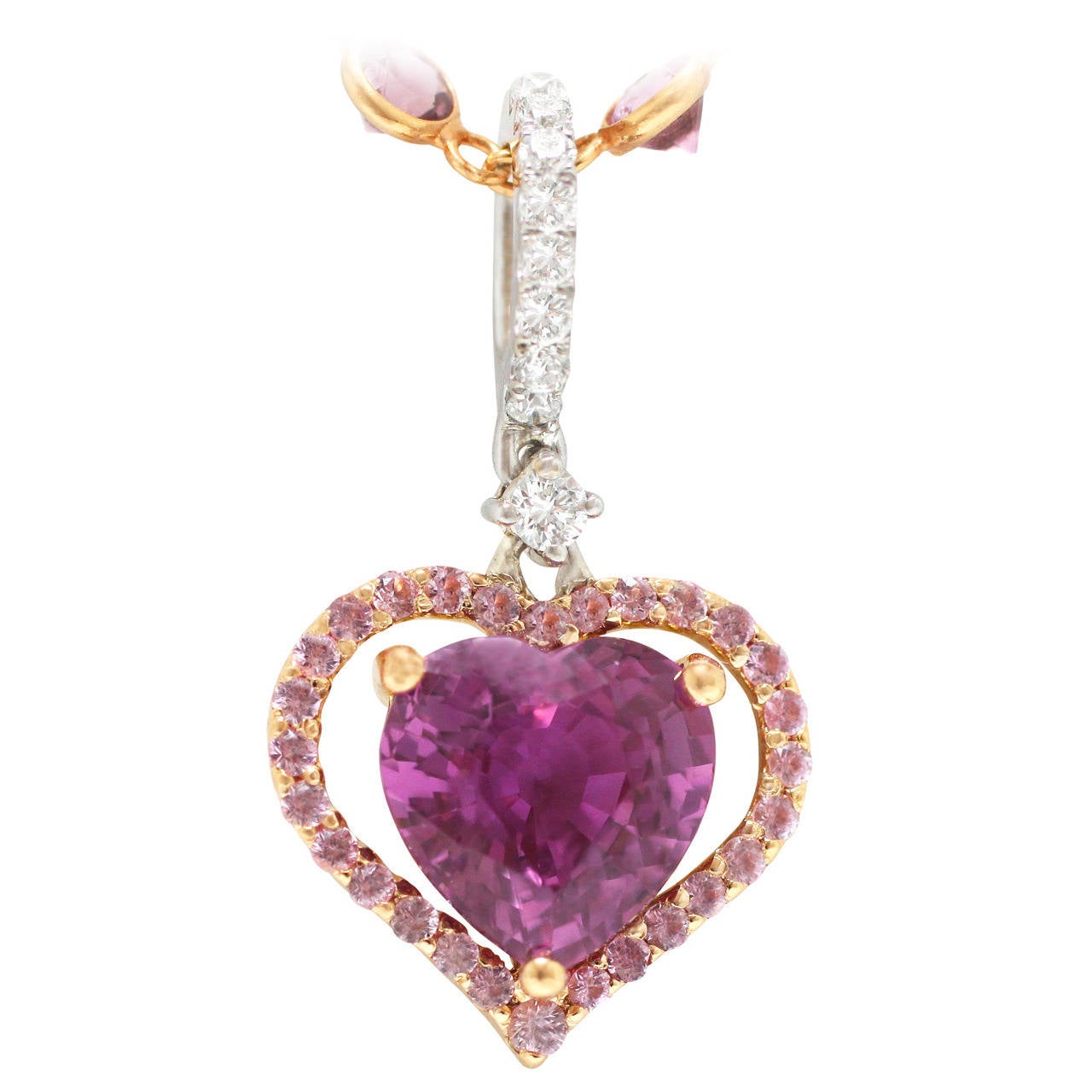 Burdeen's Elegant Pink Sapphire Heart Pendant On A Pink Sapphire Station Chain For Sale