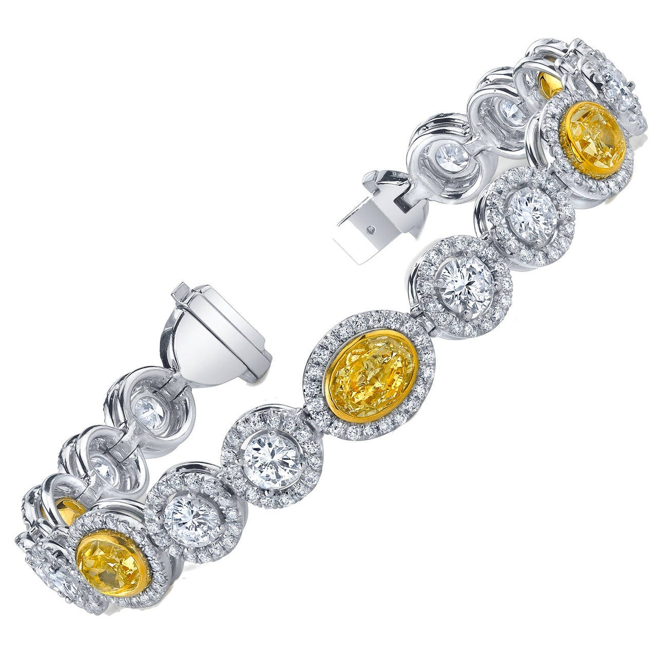 Burdeen's Exquisite Oval Yellow and Round White Diamond Gold Tennis Bracelet For Sale