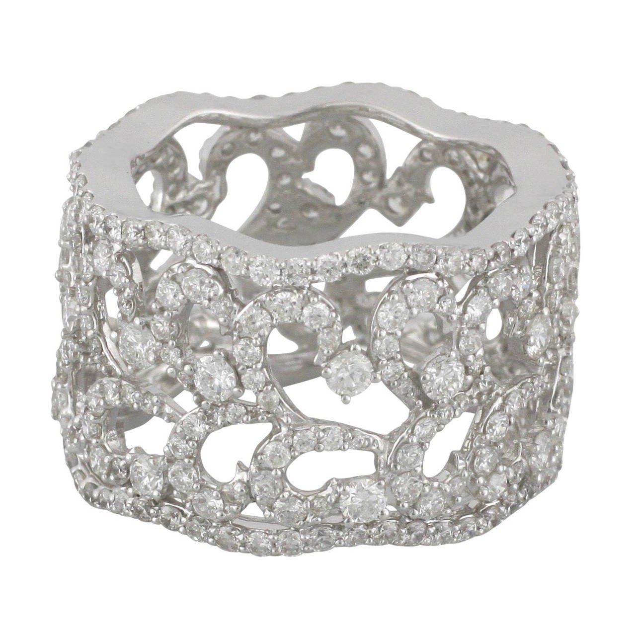 This 18kt white gold band is set with natural round brilliant cut diamonds that weigh 3.49ct.  The band is 14.5 millimeters wide, very light and comfortable.