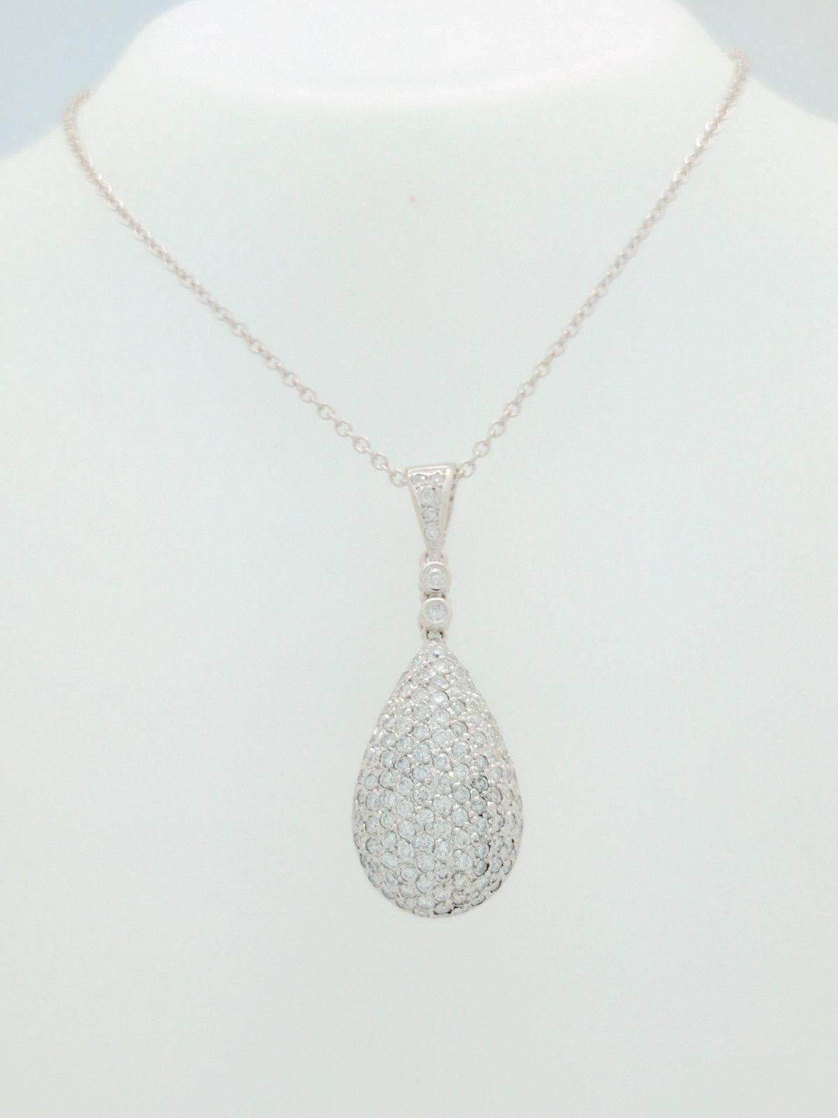 You are viewing a Beautiful Pave Diamond Tear Drop Pendant/Necklace. This is truly a stunning piece that any woman would love to add to their collection.

The pendant is crafted from 14k white gold and weighs 7.5 grams. It features 114 round natural