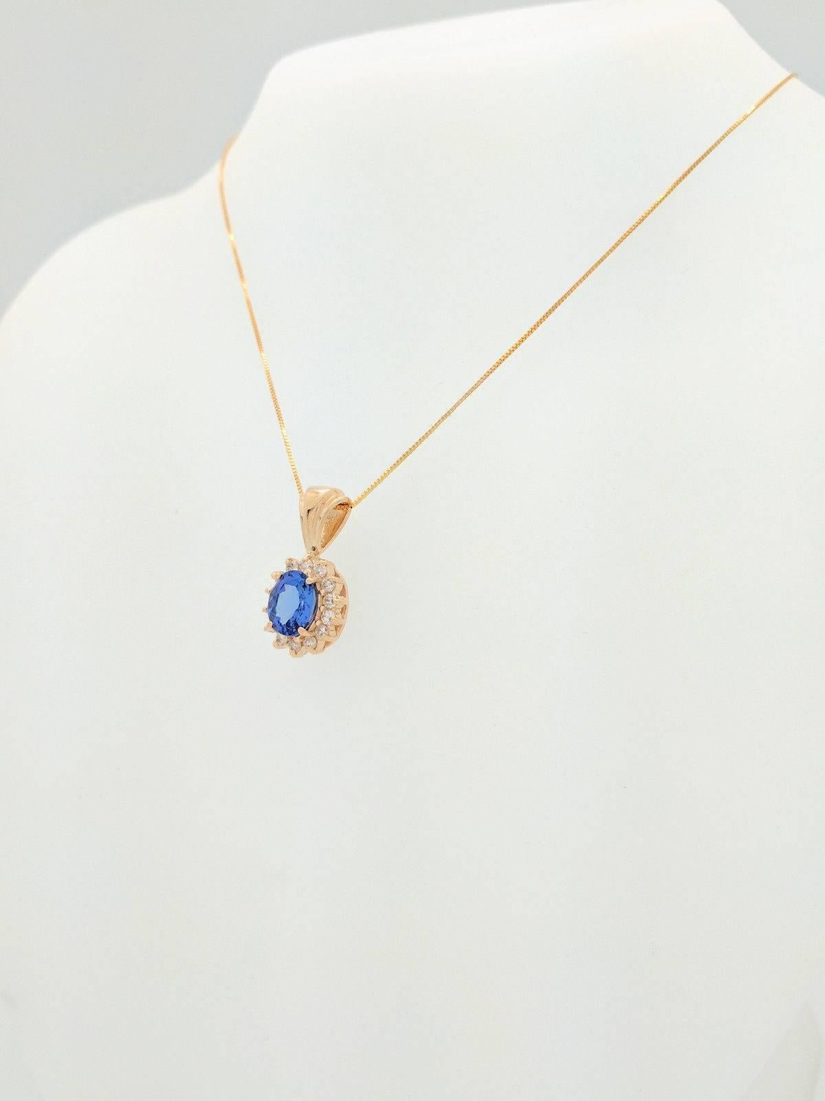 Contemporary Ladies 14 Karat Gold 2 Carat Tanzanite and Diamond Pendant Necklace 5.2 Grams