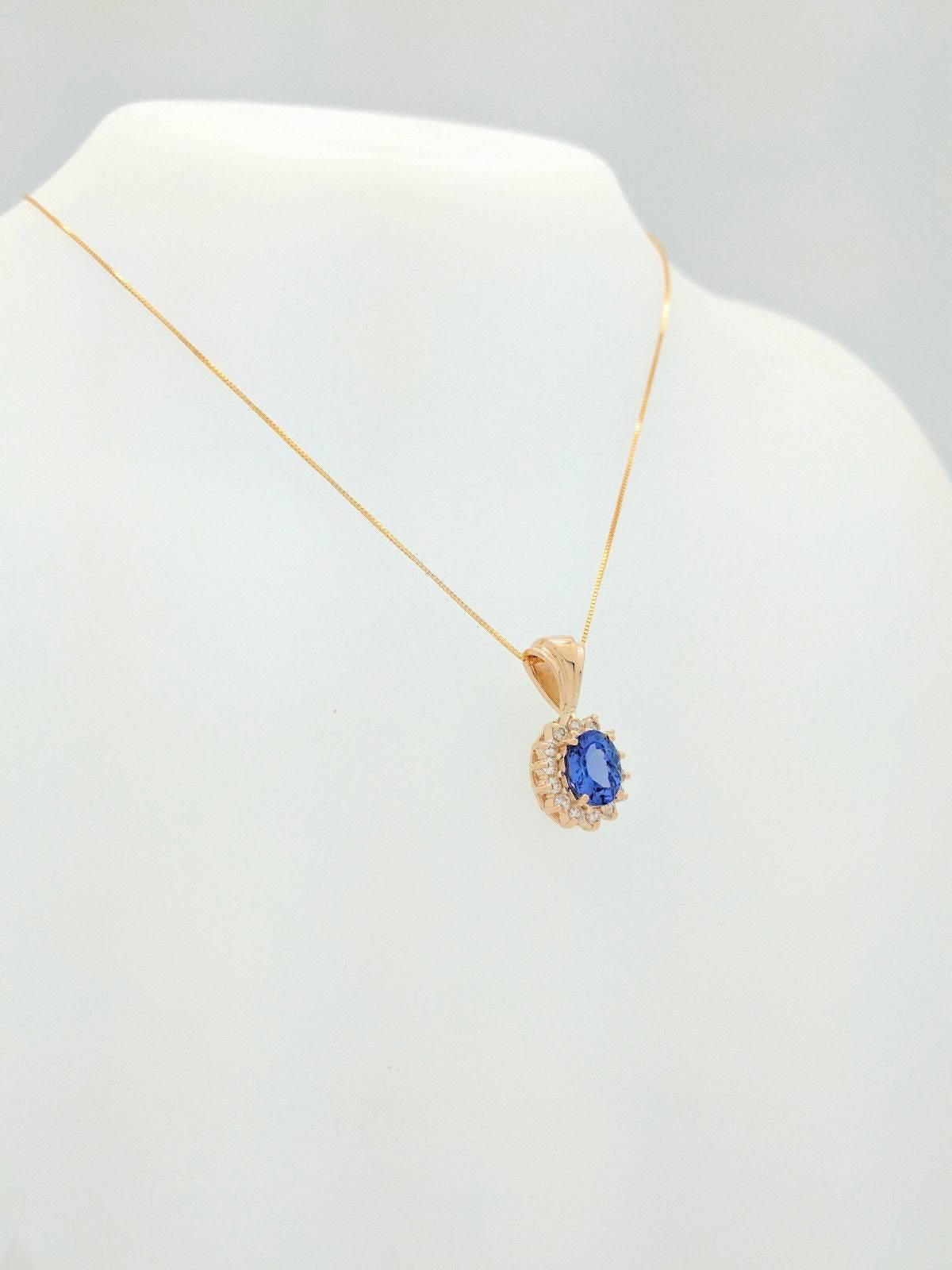 Ladies 14 Karat Gold 2 Carat Tanzanite and Diamond Pendant Necklace 5.2 Grams In Excellent Condition In Gainesville, FL