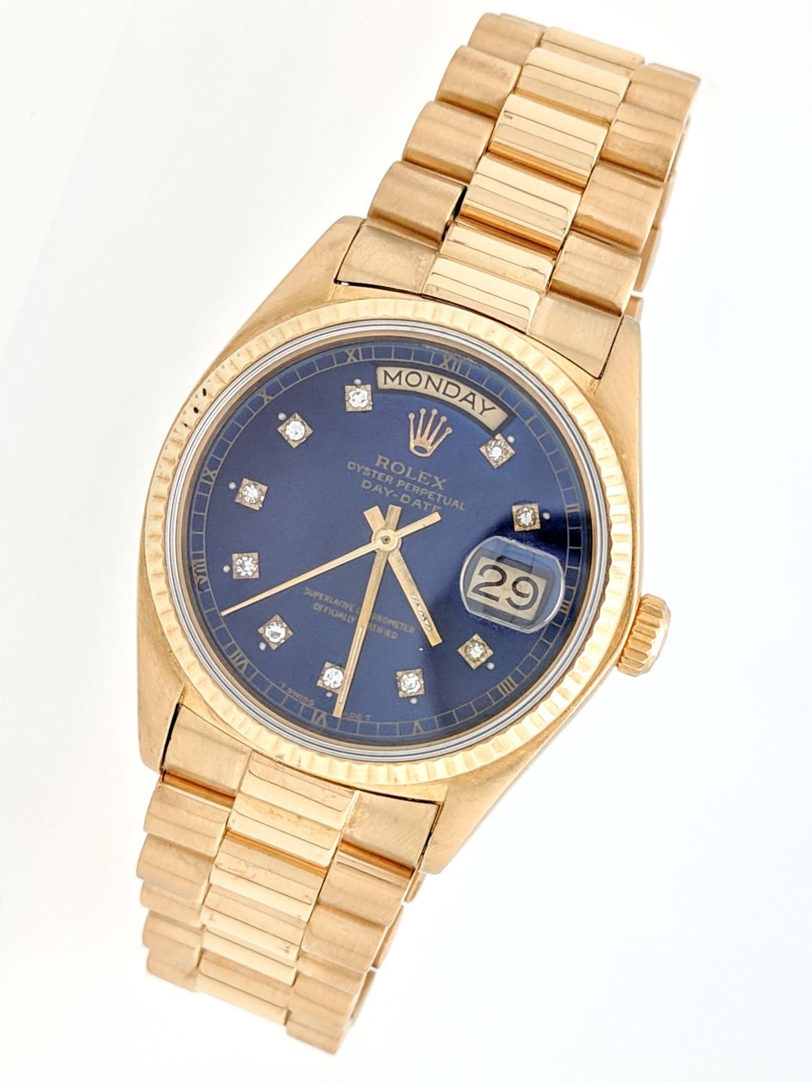 Rolex President Day-Date 18K Yellow Gold Blue Diamond Dial Men's Watch 18038

You are viewing an authentic Vintage Rolex Day-Date President 18038 Watch.

This watch features an Oyster Perpetual mechanical automatic movement, custom blue diamond