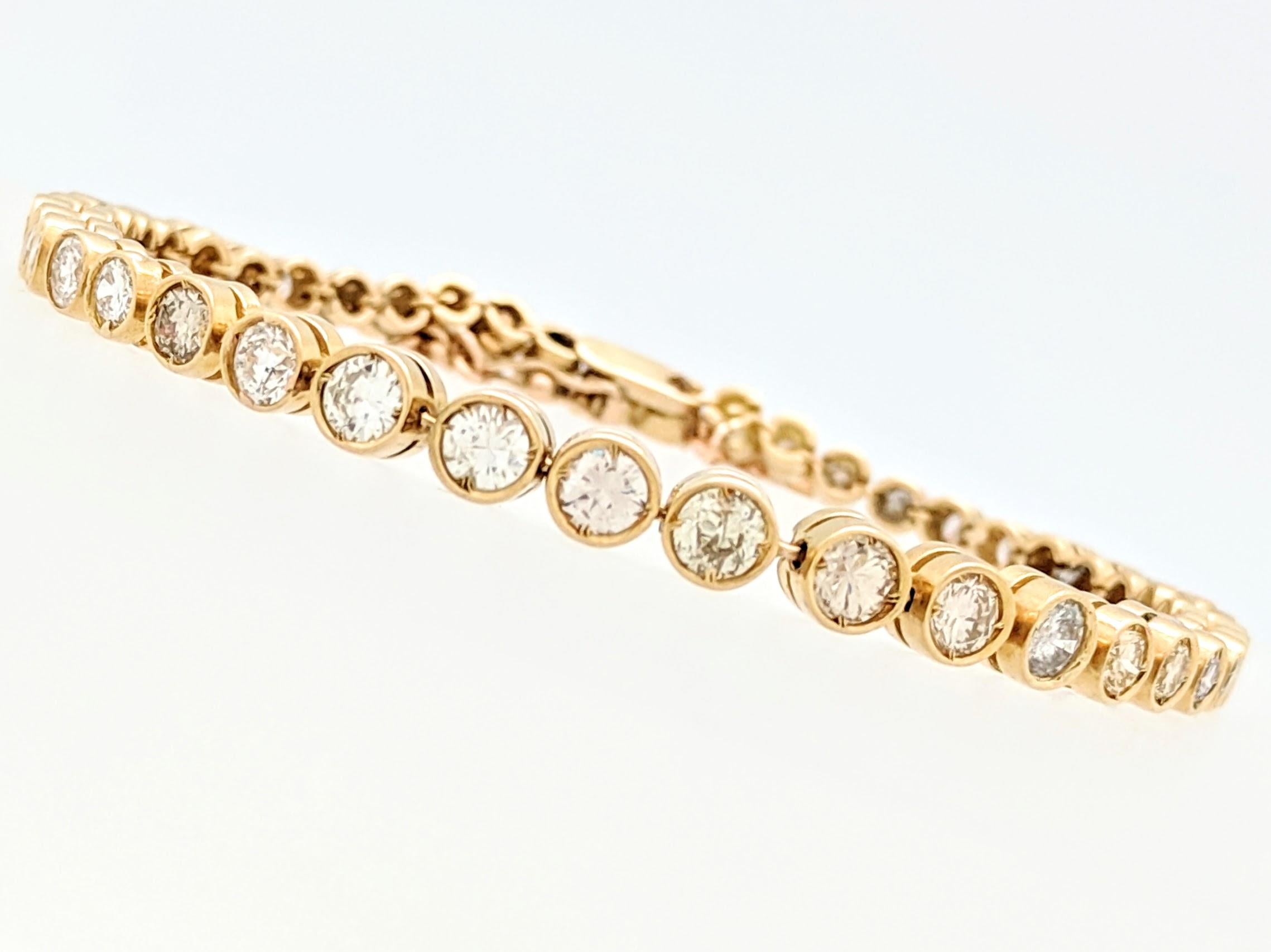 14k Yellow Gold 3.44tcw Bezel Set Diamond Tennis Bracelet

You are viewing a Beautiful Bezel Set Diamond Tennis Bracelet that is sure to make a statement!

The bracelet is crafted from 14k yellow gold, measures 5mm in width (at its widest point) and