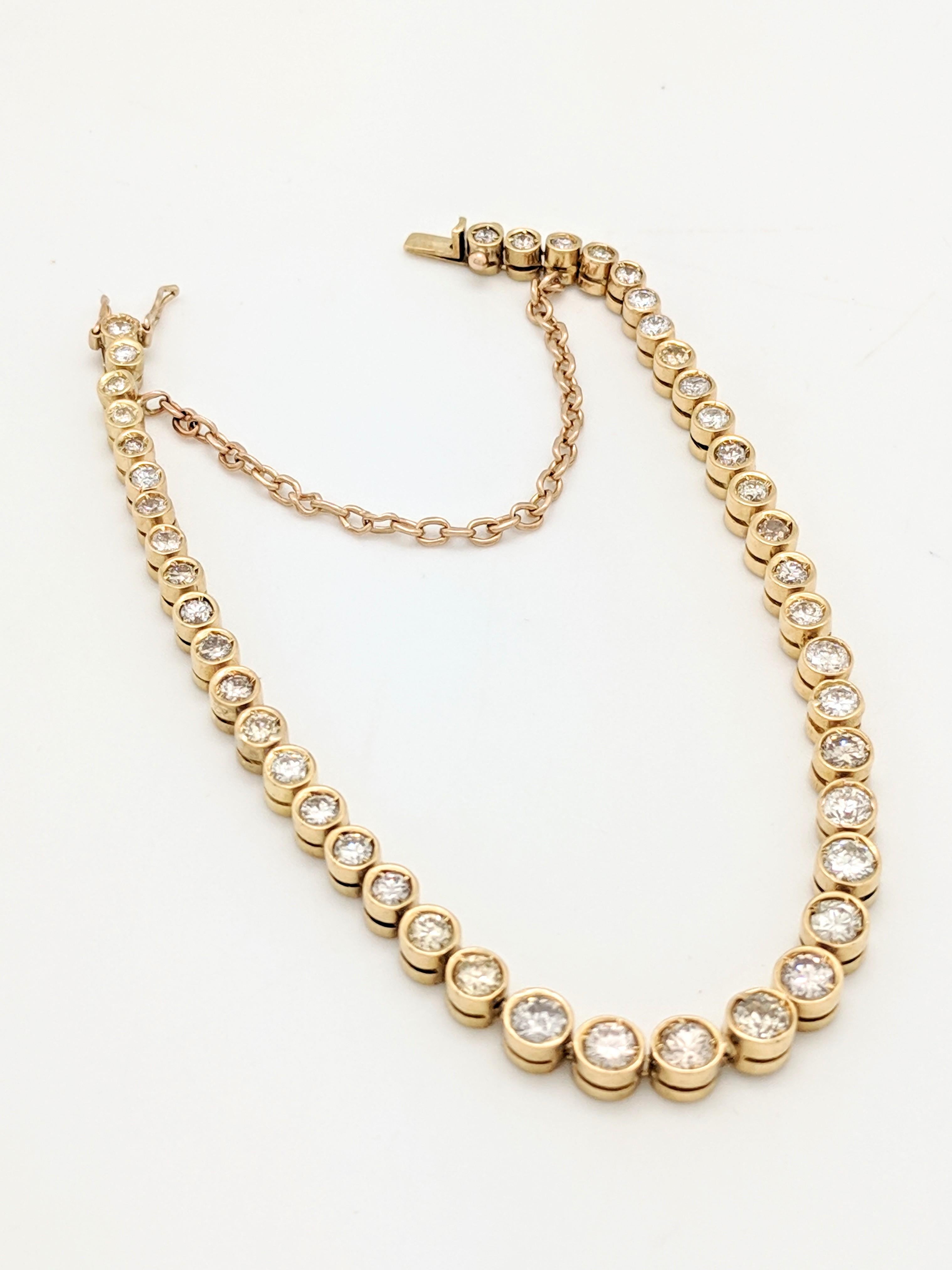 Women's 14 Karat Yellow Gold 3.44 Carat Bezel Set Diamond Tennis Bracelet For Sale