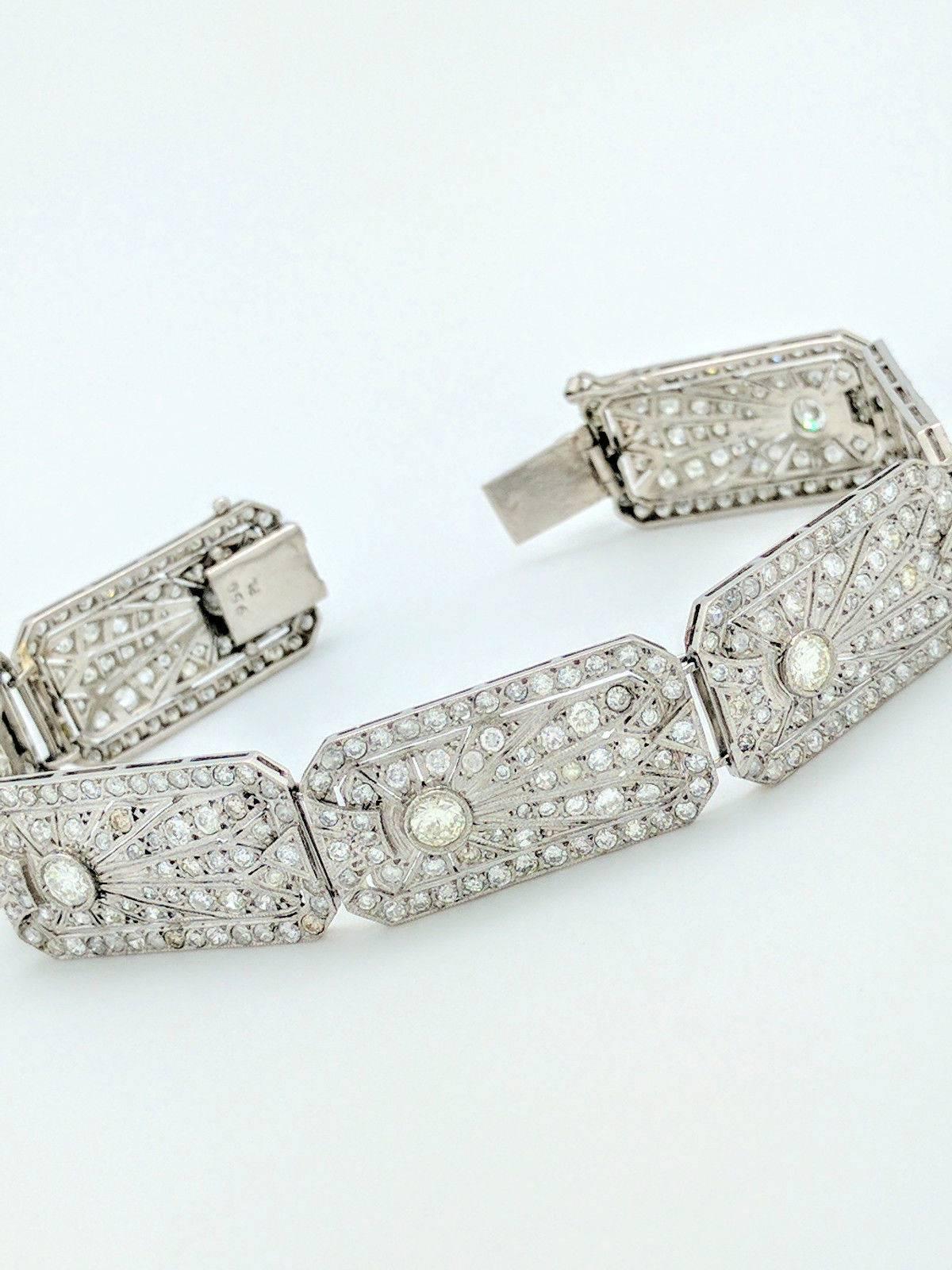 You are viewing a gorgeous 1930's Art Deco platinum bracelet. If you love the look of real vintage jewelry, this is the perfect piece for you!

This bracelet is crafted from platinum, weighs 29.7 grams and measures 14mm in width. There are 7 links