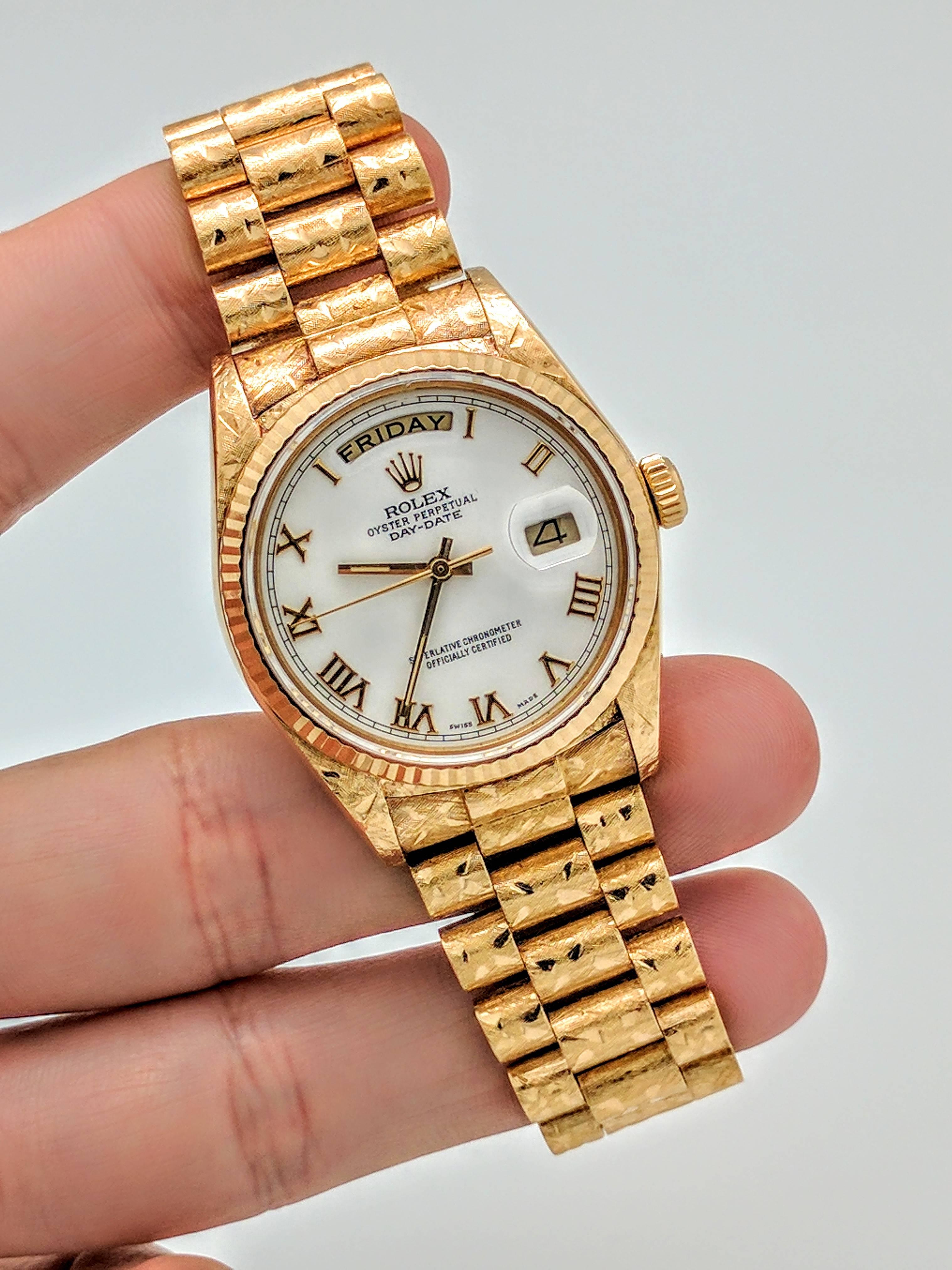 You are viewing an Authentic and all Original 18kyg Rolex Day-Date Presidential Men's Watch. Model: 18038 Serial: 8 Mill (1984-85)


This beautiful and RARE watch is solid 18k yellow gold and features an original Rolex white dial with gold Roman