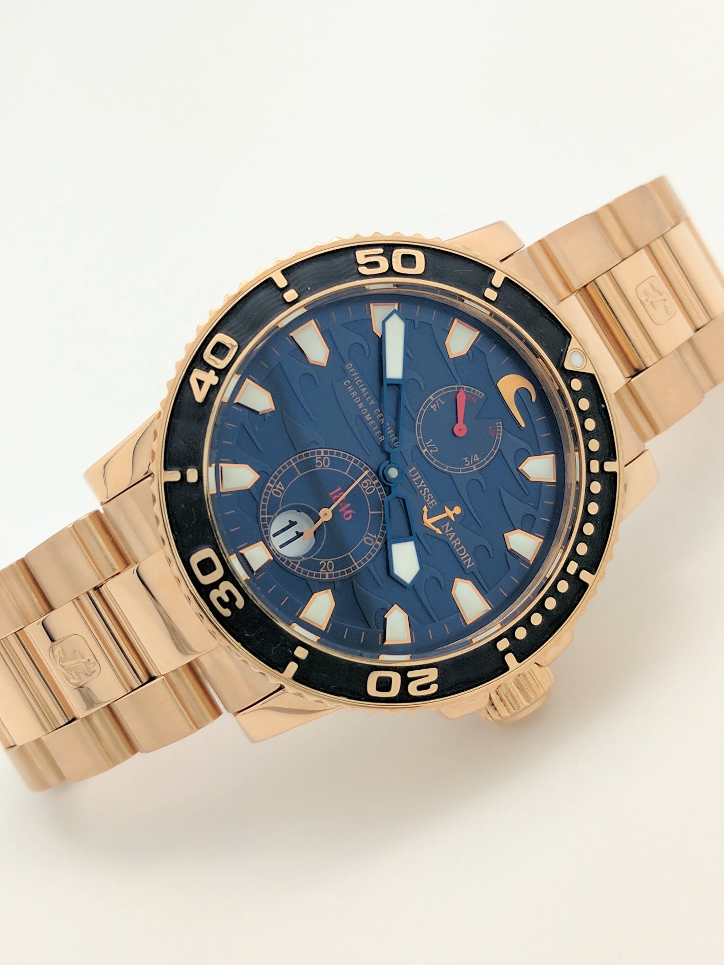 You are viewing an Authentic and all Original Ulysse Nardin Maxi Marine Blue Surf 18k Rose Gold Men's Diver Watch. Model: 266-36. This watch is a limited edition piece in rose gold and is #223 of 500. Original retail price is $44,000.

The following