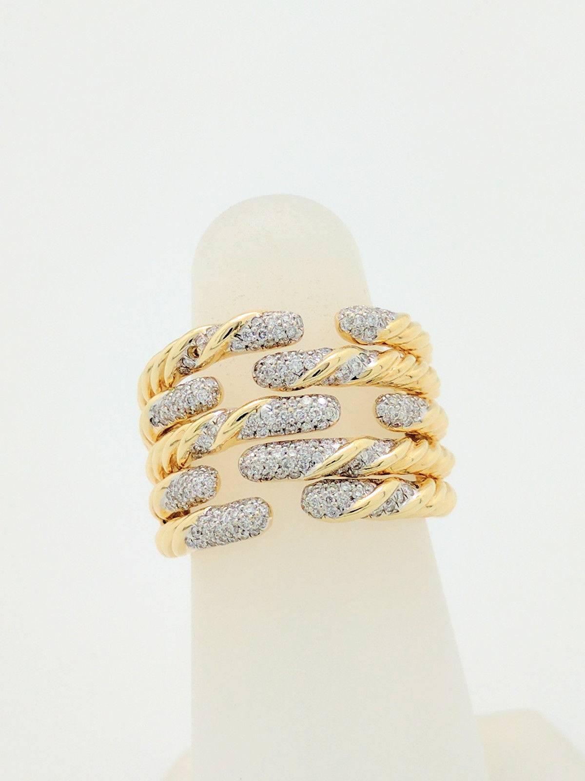 You are viewing a beautiful David Yurman five-row ring with pave diamonds from the Willow Collection.

This gorgeous David Yurman 18k yellow gold and pave diamond ring features a unique open design with .64ctw of pave diamonds. Retail price is