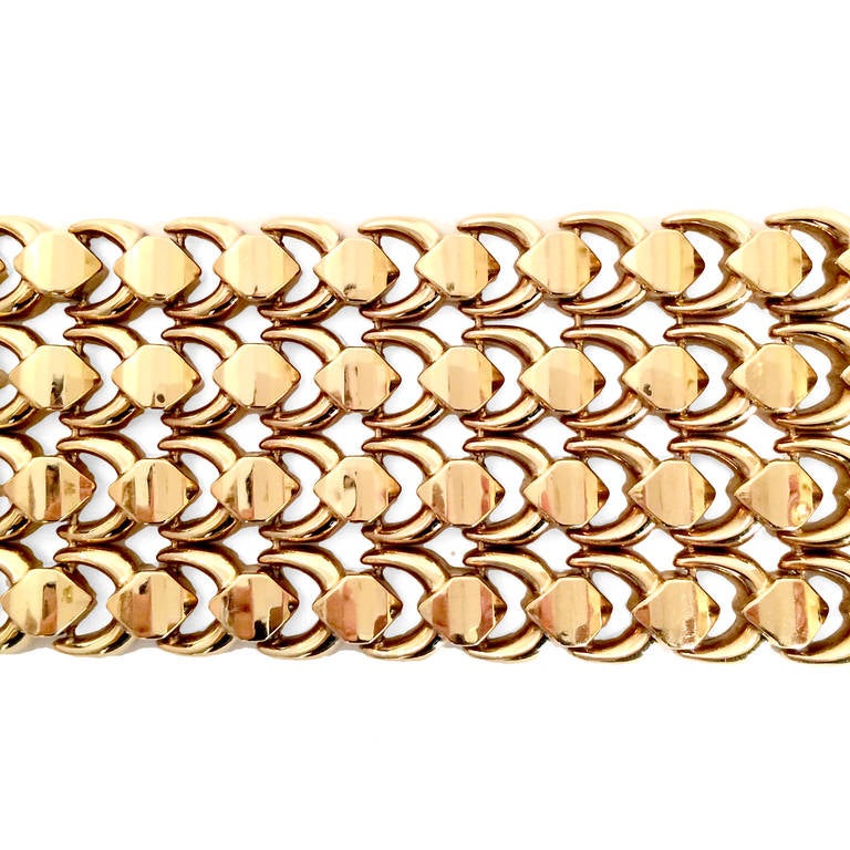 Substantial retro link bracelet in 18k pink gold (44.30 DWT) features four rows of diamond-shaped links.