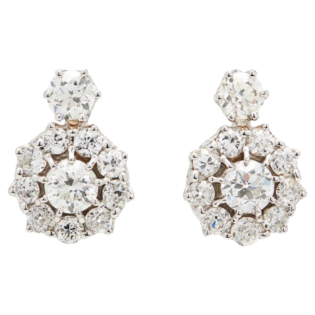 Our best selling earring! 
Classic, dazzling & never go out of style.
Old mine diamonds set in a cluster custom 18k gold mounting. 
2 larger center diamonds are approx 1.65 CTW VS2-SI. 
with an additional 4.25 carat old mine diamonds