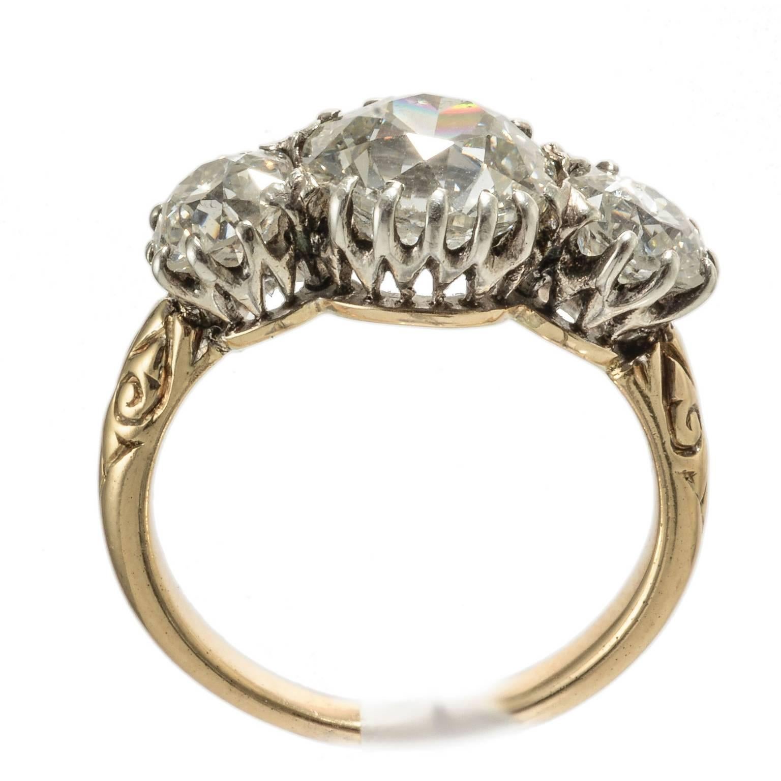 Victorian diamond three stone diamond ring 1900c 
2.80ct centre old cut with 2x.80pts either side in 18ct gold and platinum