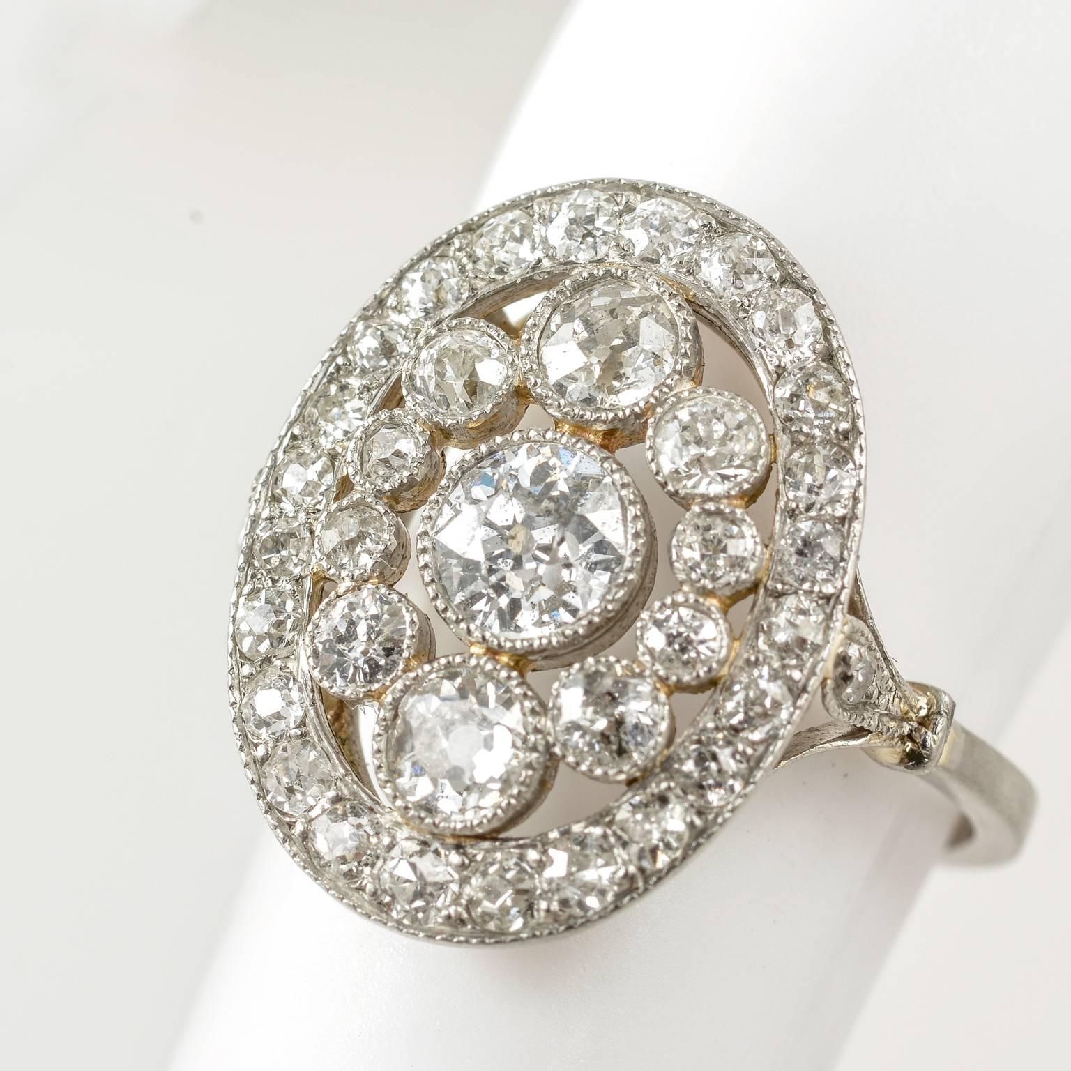 Edwardian Platinum Diamond Milligran Cluster circa 1910 Ring In Good Condition For Sale In London, GB