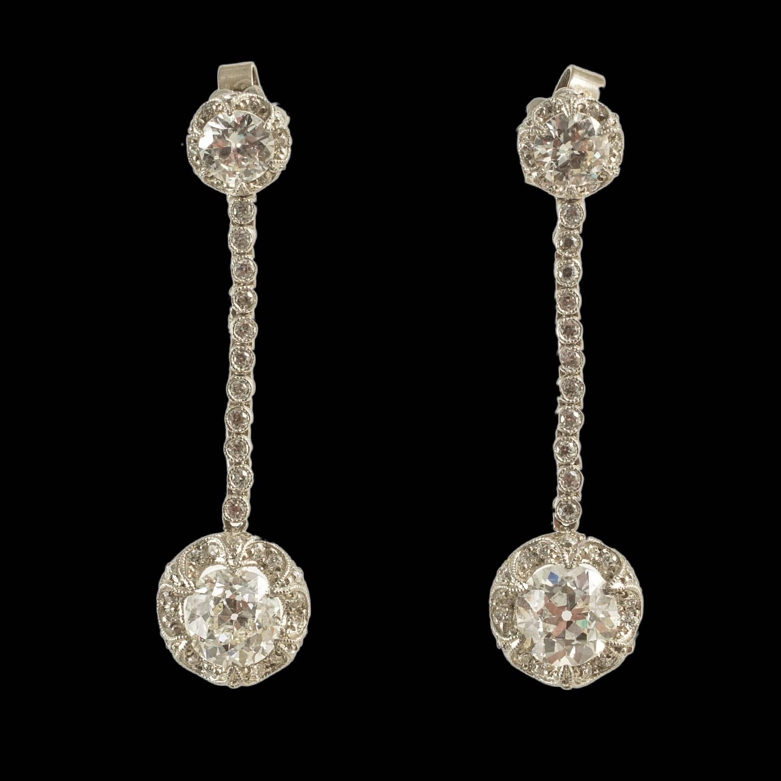Women's Edwardian Long Drop Platinum Diamond Earrings, circa 1910