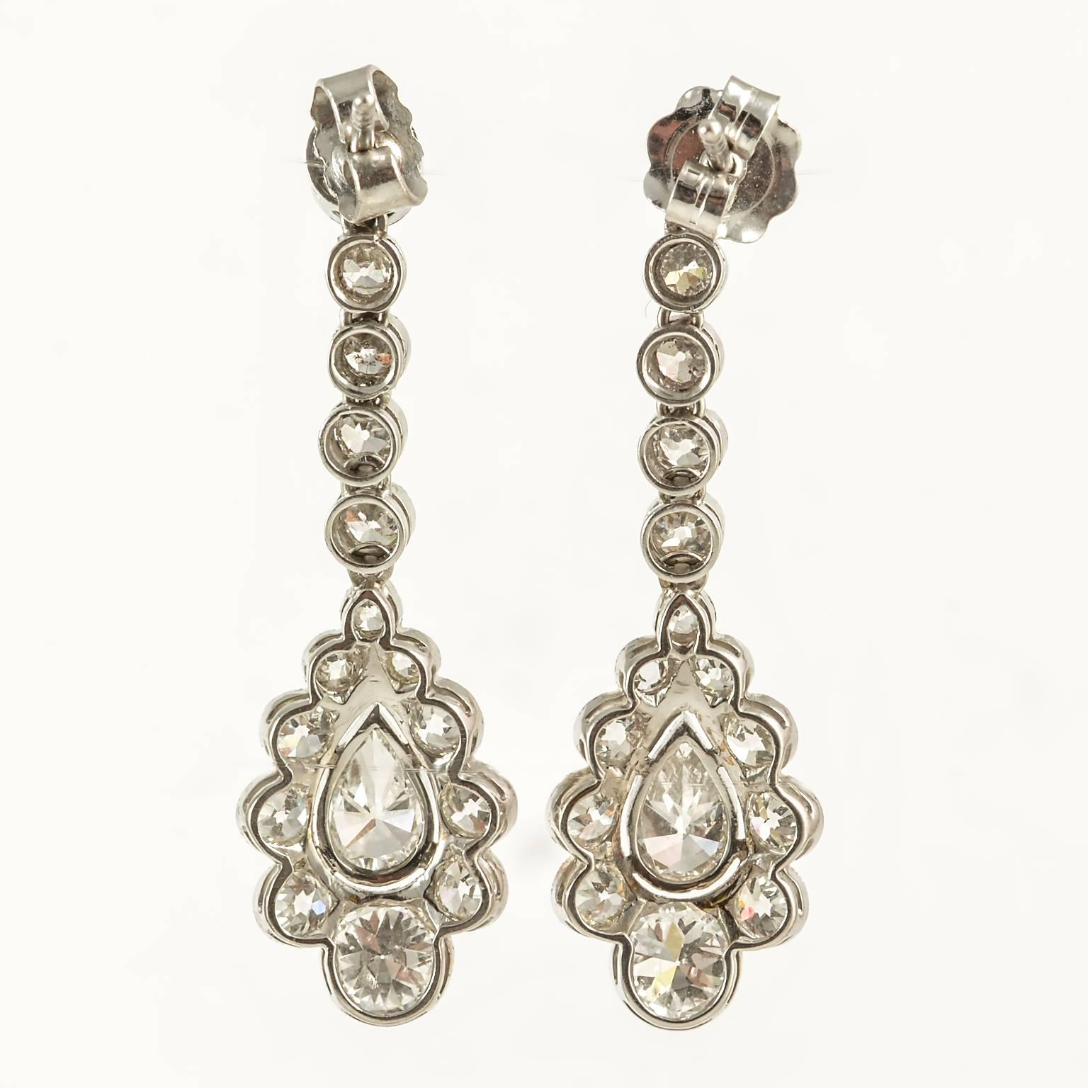 Edwardian platinum set long drop fine quality milligram diamond earrings 1910c