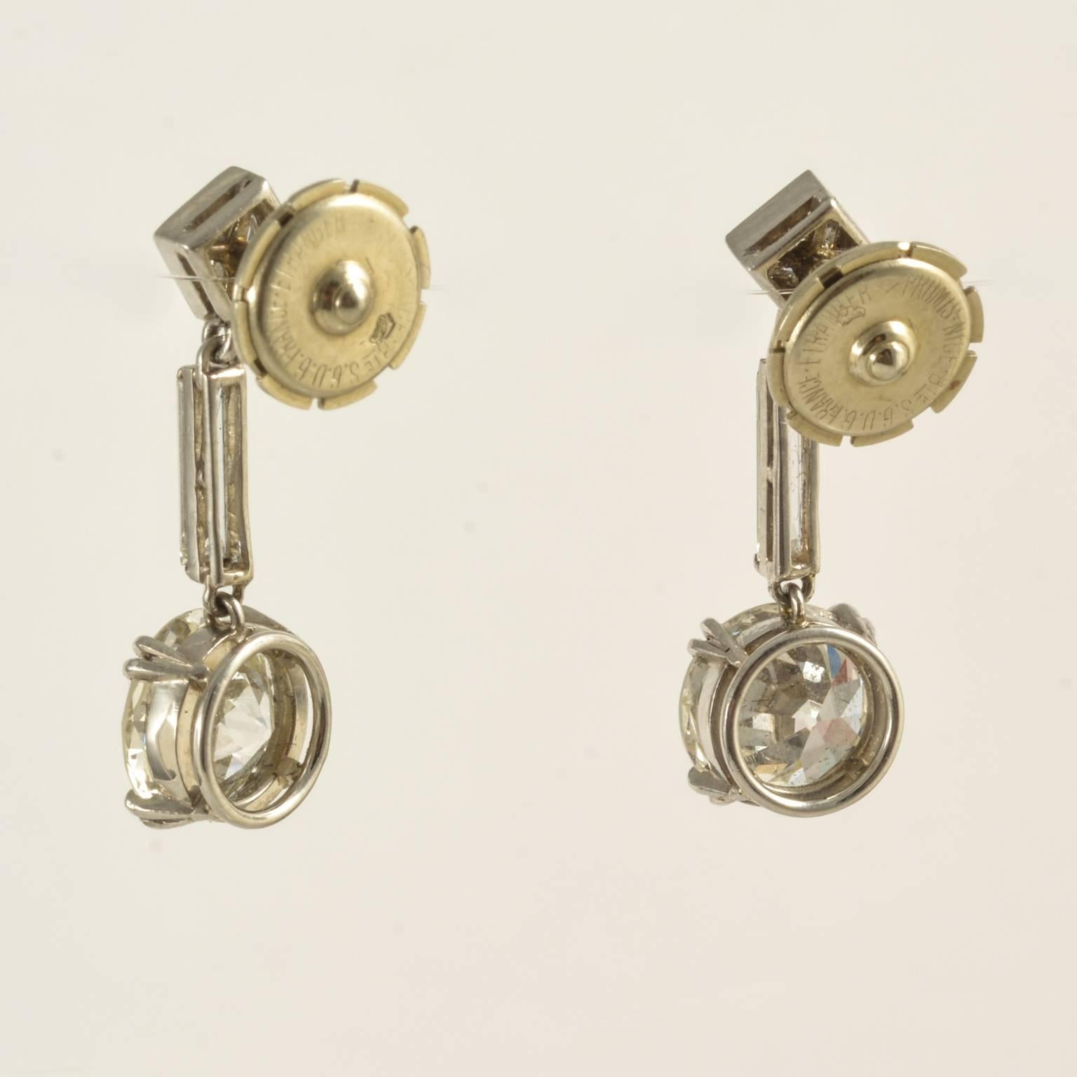 Art deco diamond drop platinum set earrings with baguette centre diamonds to 1.65ct bottom stone 1920c 