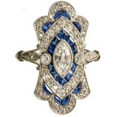 Art Deco Diamond and Calibre Sapphire Natural Marquese Platinum Ring, circa 1920